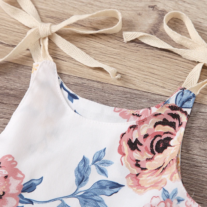 Summer Baby Girl\u2019s Casual Suspender Bodysuit Fashion Flower Print Round Neck Bow Lace-Up Triangle Romper 
Summer Baby Girl\u2019s Casual Suspender Bodysuit Fashion Flower Print Round Neck Bow Lace-Up Triangle Romper