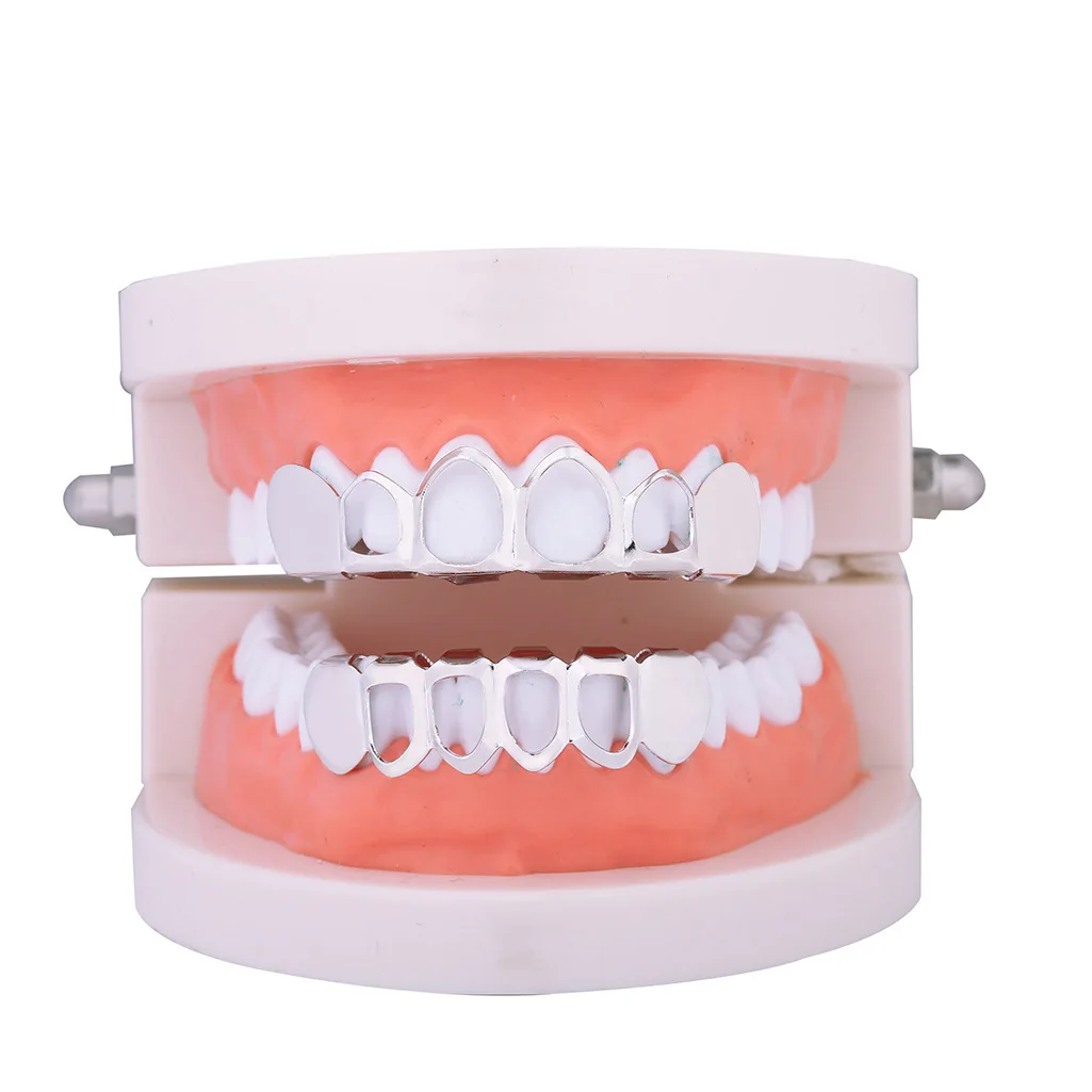 2021 New Gold Color Plated Hip hop Teeth Grill Top & Bottom Grill Hip Hop Bling Hollow Vampire Teeth for Halloween
2021 New Gold Color Plated Hip hop Teeth Grill Top & Bottom Grill Hip Hop Bling Hollow Vampire Teeth for Halloween