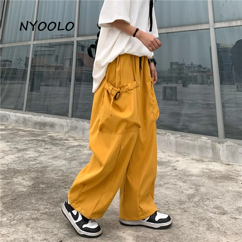 NYOOLO Casual Streetwear Big Pockets Elastic Waist Wide Leg Cargo Pants Women Men Clothing Autumn Hip Hop Skateboard Trousers
NYOOLO Casual Streetwear Big Pockets Elastic Waist Wide Leg Cargo Pants Women Men Clothing Autumn Hip Hop Skateboard Trousers