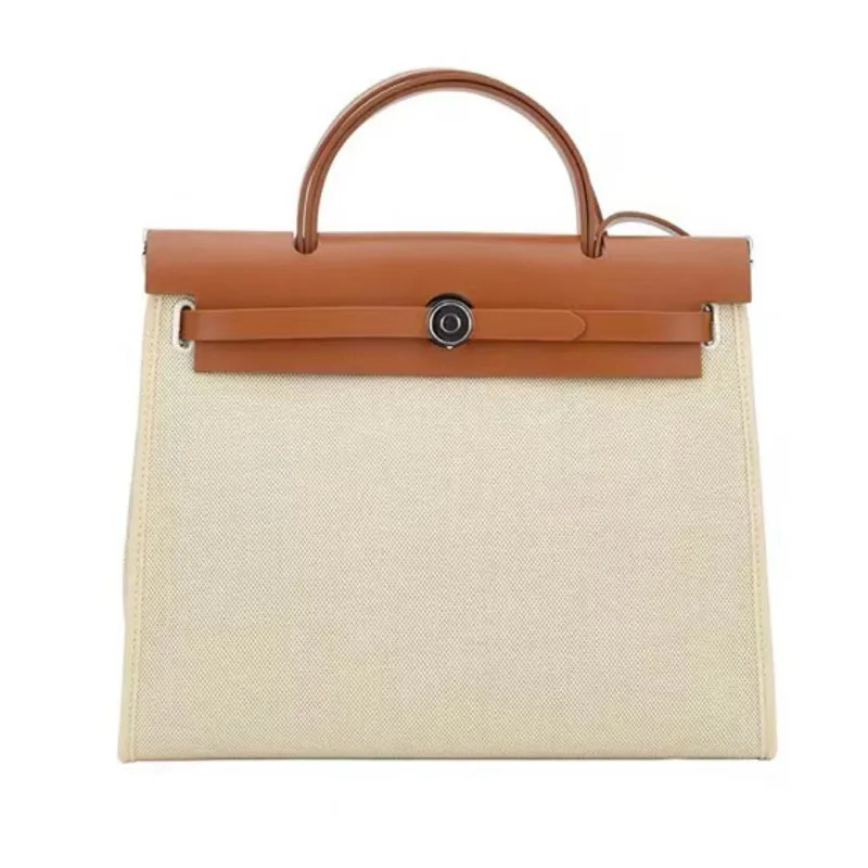 2021 New Fashion Versatile Waterproof Canvas Kelly Bag Texture Leather Collision Women's Bag Locked Hand-held Shoulder Messenger
2021 New Fashion Versatile Waterproof Canvas Kelly Bag Texture Leather Collision Women's Bag Locked Hand-held Shoulder Messenger