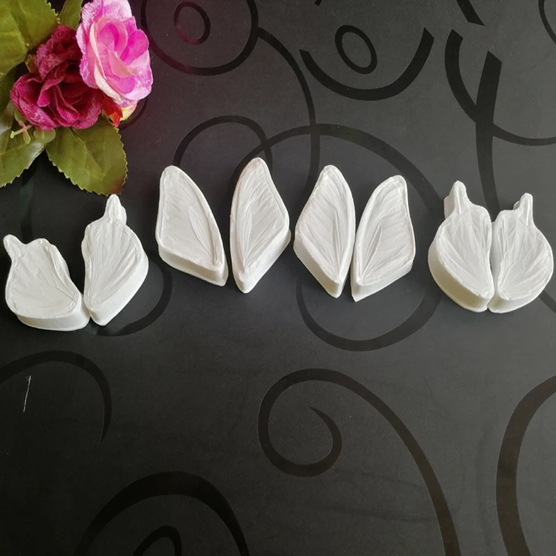 NEW 8pcs/lot Butterfly Double Silicone Molds Press Gumpaste Fondant Cake Decorating Tools Candy Sugar Fondant Moulds M2403
NEW 8pcs/lot Butterfly Double Silicone Molds Press Gumpaste Fondant Cake Decorating Tools Candy Sugar Fondant Moulds M2403