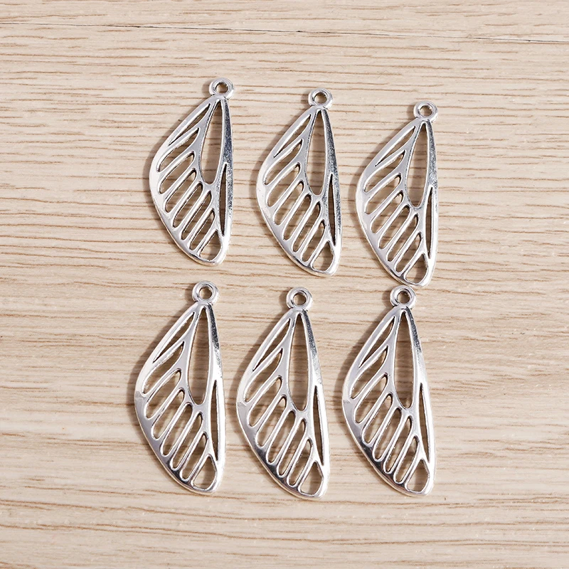 30pcs 29*12mm Zinc Alloy Silver Color Wing Charms for Making DIY Drop Earrings Pendants Necklaces Handmade Jewelry Findings
30pcs 29*12mm Zinc Alloy Silver Color Wing Charms for Making DIY Drop Earrings Pendants Necklaces Handmade Jewelry Findings