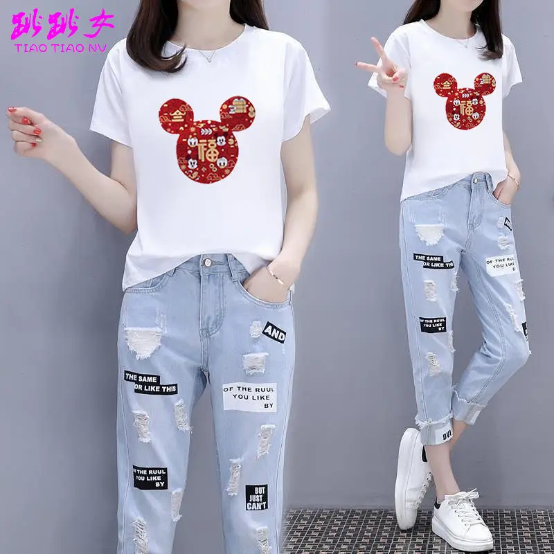 Summer 2021 New Short-Sleeved T-Shirt + Ripped Nine-Point Jeans Two-Piece Female Student Korean Version
Summer 2021 New Short-Sleeved T-Shirt + Ripped Nine-Point Jeans Two-Piece Female Student Korean Version