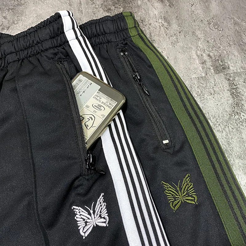 Casual Fashion Green White Purple stripes Side Webbing AWGE Needles Sweatpants Men Women Butterfly Embroidery Needles AWGE Pants
Casual Fashion Green White Purple stripes Side Webbing AWGE Needles Sweatpants Men Women Butterfly Embroidery Needles AWGE Pants