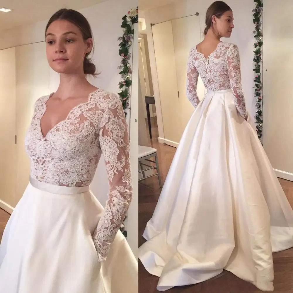 2020 Simple Lace Satin A Line Wedding Dress With Pockets illusion Long Sleeve Sexy See Through Deep V neck Bridal Gowns Vestidos
2020 Simple Lace Satin A Line Wedding Dress With Pockets illusion Long Sleeve Sexy See Through Deep V neck Bridal Gowns Vestidos