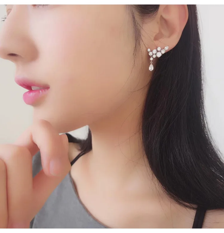 Designer original new zircon platinum wings drop-shaped earrings luxury exquisite and elegant ladies silver jewelry
Designer original new zircon platinum wings drop-shaped earrings luxury exquisite and elegant ladies silver jewelry