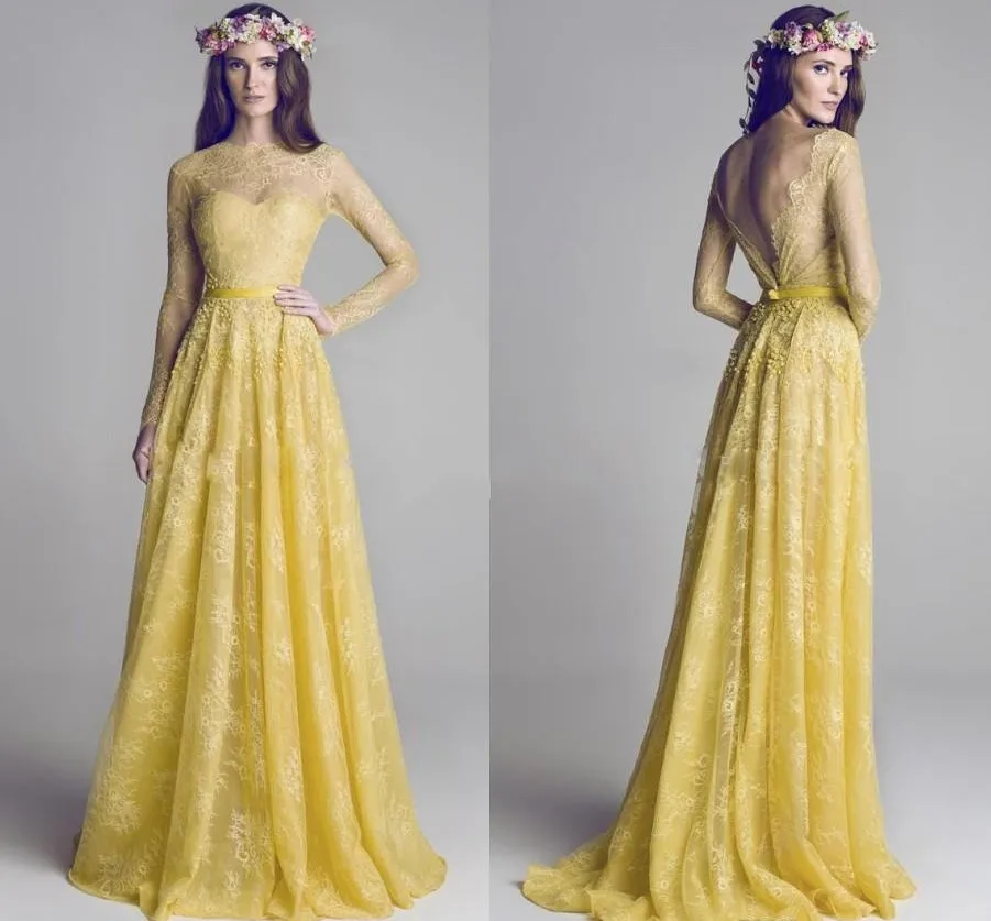 Hamda Al Fahim 2021 Evening Prom Dresses with Long Sleeve Sheer Bateau Neck Backless Yellow Lace Formal Gowns Long Vestiods
Hamda Al Fahim 2021 Evening Prom Dresses with Long Sleeve Sheer Bateau Neck Backless Yellow Lace Formal Gowns Long Vestiods