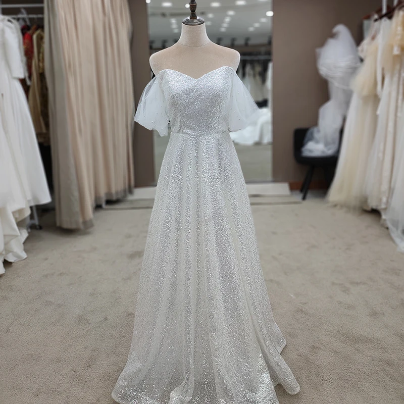 Sequined Wedding Dress Sweetheart Tulle Sleeves with Pearls A Line Zipper 2021 Factory Price Handmade Glitter Bridal Gown 3133
Sequined Wedding Dress Sweetheart Tulle Sleeves with Pearls A Line Zipper 2021 Factory Price Handmade Glitter Bridal Gown 3133