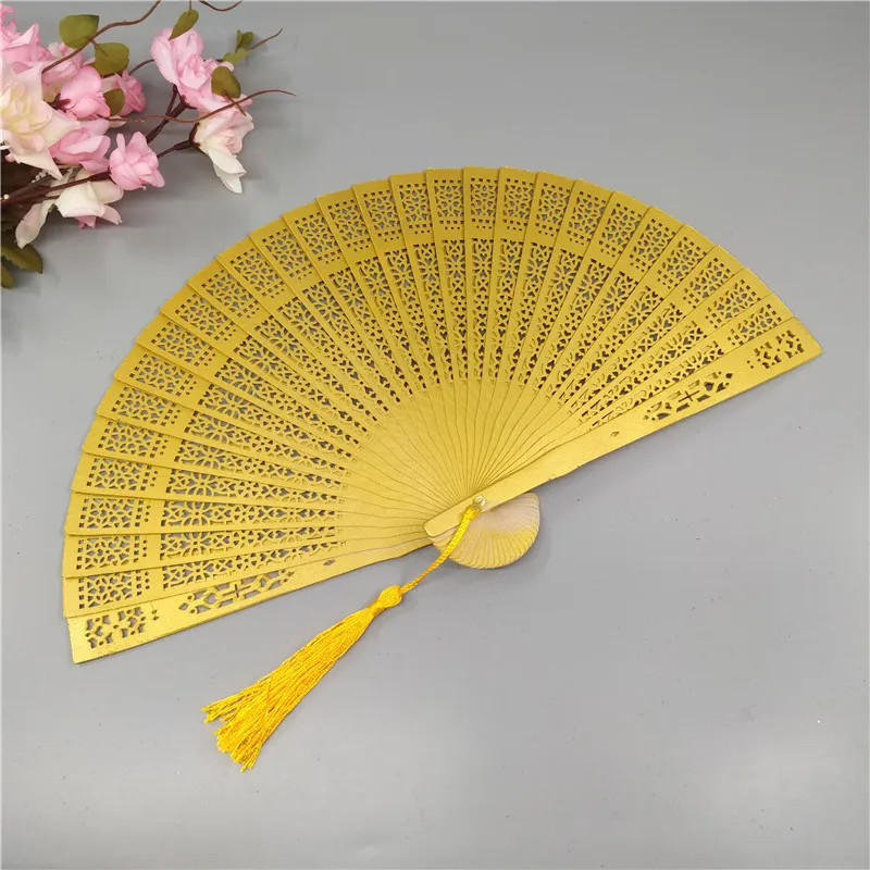 6-inch color high-quality fragrant wood fan wholesale hollow folding fan wedding gift side bone customization can add fringe
6-inch color high-quality fragrant wood fan wholesale hollow folding fan wedding gift side bone customization can add fringe