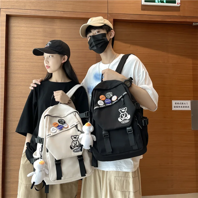Fashion Large Capacity Cartoon Badge Canvas Schoolbag For Boys And Girls School Bags Backpack Women Sacoche Homme Bolso Mujer
Fashion Large Capacity Cartoon Badge Canvas Schoolbag For Boys And Girls School Bags Backpack Women Sacoche Homme Bolso Mujer