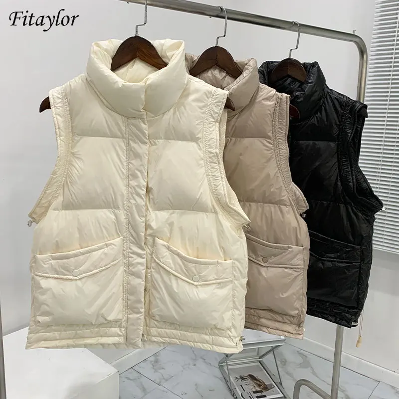 Fitaylor Winter Women Ultra Light Warm Vest Coat 90% White Duck Down Sleeveless Jacket Stand Collar Hem Retractable Vest Outwear
Fitaylor Winter Women Ultra Light Warm Vest Coat 90% White Duck Down Sleeveless Jacket Stand Collar Hem Retractable Vest Outwear