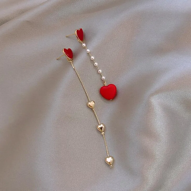 EM098 personality Heart Long Tassel Imitation Pearl Asymmetry Alloy Drop Earrings Popular Accessories Wholesale
EM098 personality Heart Long Tassel Imitation Pearl Asymmetry Alloy Drop Earrings Popular Accessories Wholesale