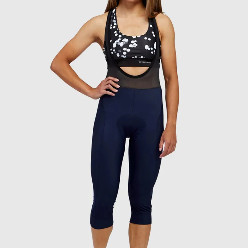 Women Solid Color 3/4 Bibs Shorts Knees Warm In Cooler With High Density Pad Triathlon Licra Fabric Cycling Race Bib Pants
Women Solid Color 3/4 Bibs Shorts Knees Warm In Cooler With High Density Pad Triathlon Licra Fabric Cycling Race Bib Pants