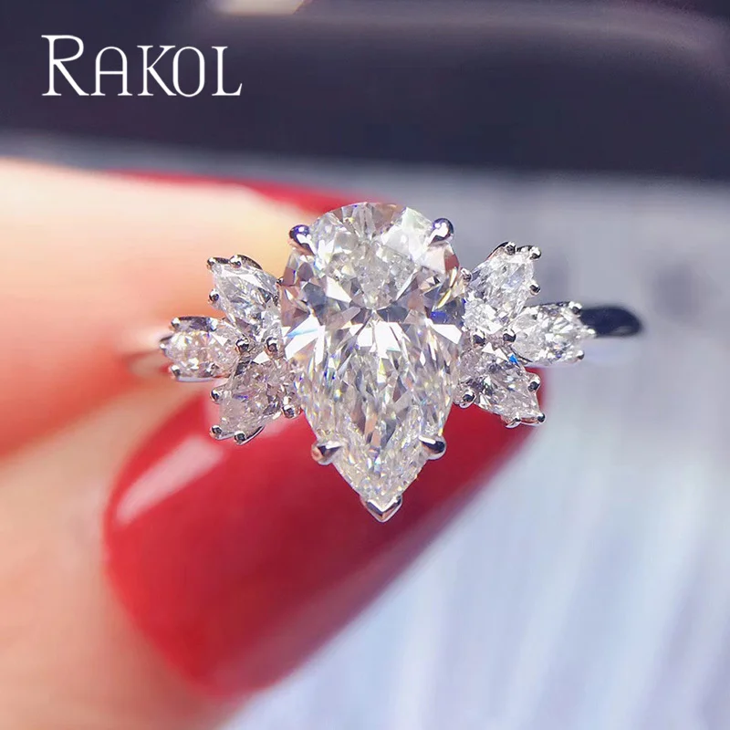 RAKOL Creative Pear Shape Drop Shape Zircon Ring White Gold Fashion Engagement Jewelry For Gift Modern Rings for Women ZRL17
RAKOL Creative Pear Shape Drop Shape Zircon Ring White Gold Fashion Engagement Jewelry For Gift Modern Rings for Women ZRL17