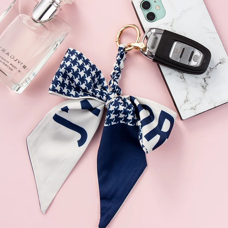 Car key chain ornaments net red bow pendant simple atmosphere goddess key chain ring bag lanyard
Car key chain ornaments net red bow pendant simple atmosphere goddess key chain ring bag lanyard