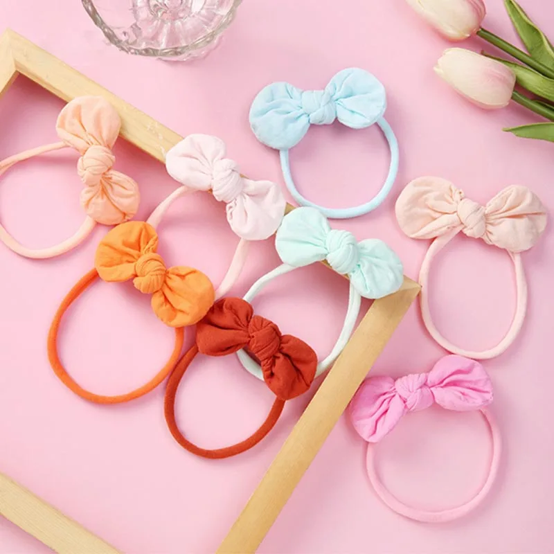 24 шт./лот, мягкие повязки для волос с бантом, головные уборы, эластичные нейлоновые модные детские повязки на голову без следов, Детские аксе... 
24 шт./лот, мягкие повязки для волос с бантом, головные уборы, эластичные нейлоновые модные детские повязки на голову без следов, Детские аксе...