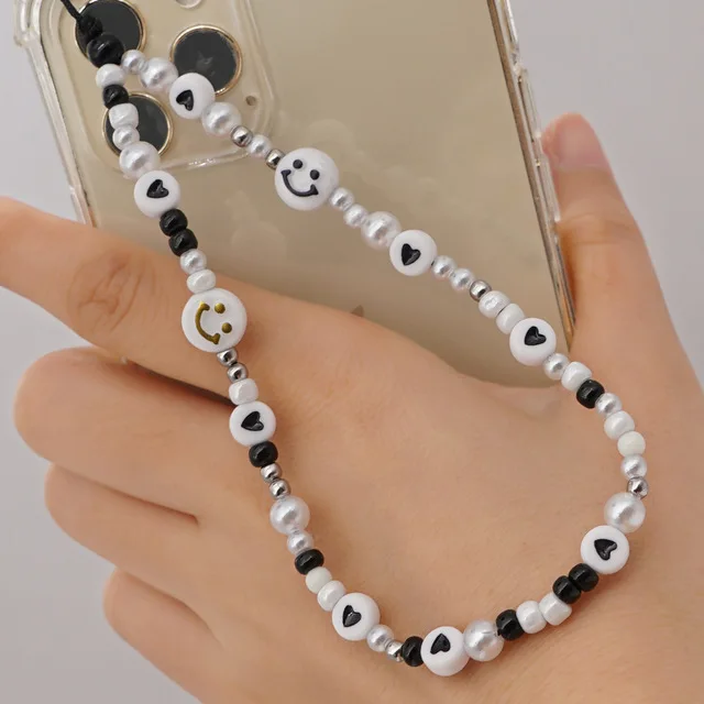 Bohemian Personality Female Mobile Phone Chain Imitation Pearl White Rice Beads Black Round Beads Anti-Lost Mobile Phone Lanyard
Bohemian Personality Female Mobile Phone Chain Imitation Pearl White Rice Beads Black Round Beads Anti-Lost Mobile Phone Lanyard