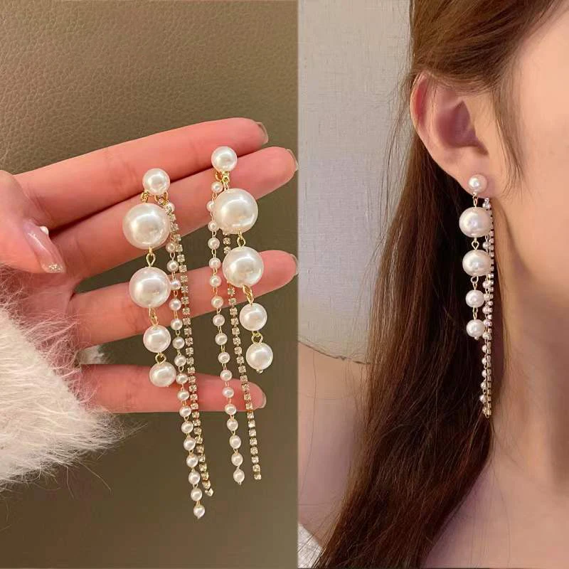 S925 Silver Needle Fairy Pearl Tassel Earrings For Women Fashion Temperament Women's Earrings Charm Earrings Jewelry Gifts 
S925 Silver Needle Fairy Pearl Tassel Earrings For Women Fashion Temperament Women's Earrings Charm Earrings Jewelry Gifts