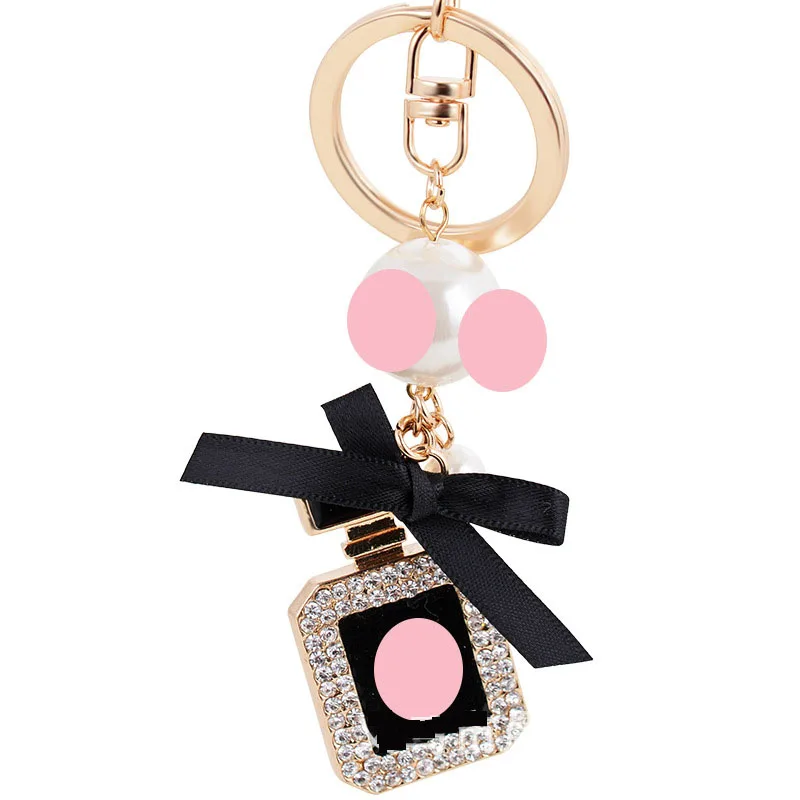 New elegant pearl crystal rhinestone perfume bottle key chain fashion golden key ring women's car bag charm key chain gift
New elegant pearl crystal rhinestone perfume bottle key chain fashion golden key ring women's car bag charm key chain gift