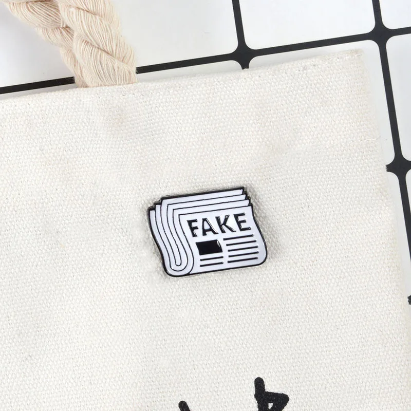 Fake Newspaper Brooch Fashion Jewelry Black White Lapel Pin Ceative Gifts Backpack Badge Funny Enamel Pins Cartoon Chest Brooch
Fake Newspaper Brooch Fashion Jewelry Black White Lapel Pin Ceative Gifts Backpack Badge Funny Enamel Pins Cartoon Chest Brooch