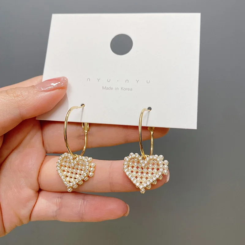 Zeojrlly Metal Trendy Heart Women Dangle Earrings Hollow Love Korean Fashion Sweet Simple Elegant Female Jewelry
Zeojrlly Metal Trendy Heart Women Dangle Earrings Hollow Love Korean Fashion Sweet Simple Elegant Female Jewelry