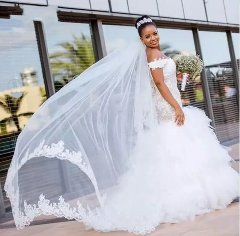 Винтажное Многоярусное свадебное платье-Русалка с открытыми плечами и кружевным рукавом платье для невесты в кантри африканская Роба De Mariee...
Винтажное Многоярусное свадебное платье-Русалка с открытыми плечами и кружевным рукавом платье для невесты в кантри африканская Роба De Mariee...