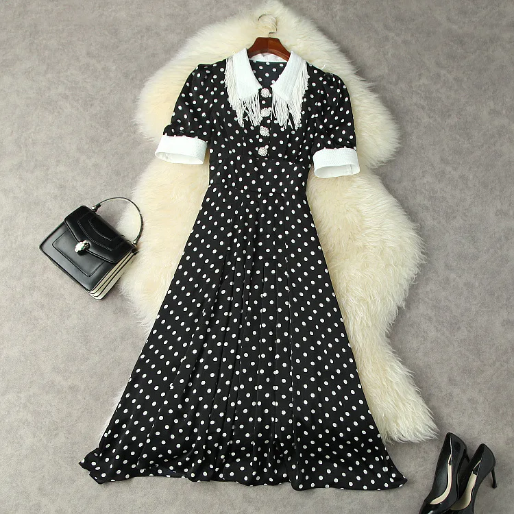 European and American women's wear for summer 2021 Short sleeve tassel sequined lapel Fashion polka dot print pleated dress
European and American women's wear for summer 2021 Short sleeve tassel sequined lapel Fashion polka dot print pleated dress