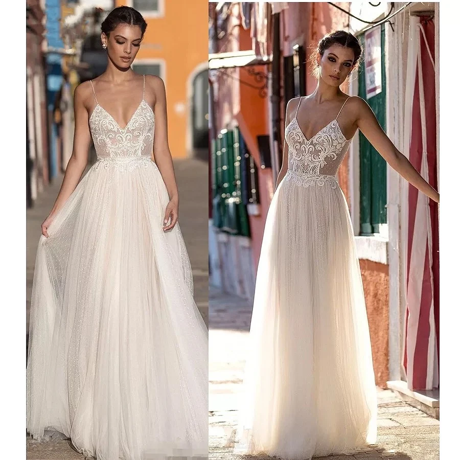 Sexy Boho Wedding Dresses A-line Lace Applique Beach Bridal Dresses Backless Spaghetti Strap V Neck Illusion Wedding Gowns 2021
Sexy Boho Wedding Dresses A-line Lace Applique Beach Bridal Dresses Backless Spaghetti Strap V Neck Illusion Wedding Gowns 2021