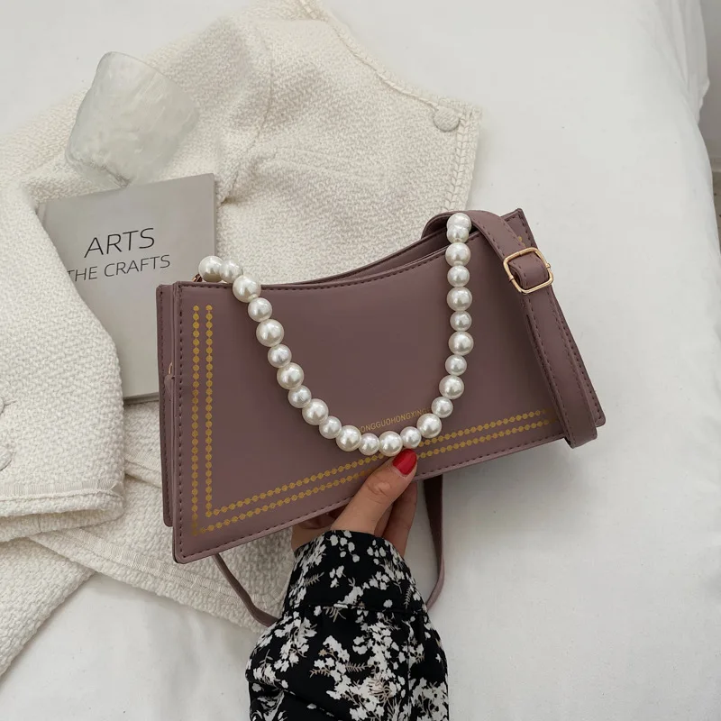 Женские сумки на плечо, новый дизайн, портативная однотонная женская сумка-мессенджер из искусственной кожи с жемчугом в стиле ретро, прост...
Женские сумки на плечо, новый дизайн, портативная однотонная женская сумка-мессенджер из искусственной кожи с жемчугом в стиле ретро, прост...