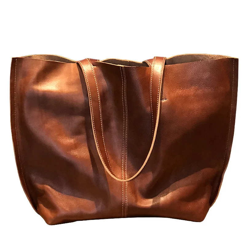Bag women's 2020 new portable shoulder bag big bag head layer leather simple large capacity tote bag leather
Bag women's 2020 new portable shoulder bag big bag head layer leather simple large capacity tote bag leather