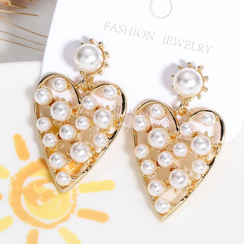New Brand Statement Korean Pearl Earrings for Women Girls Temperament Love Pearl Earring Fashion Retro Metal Hollow Jewelry Gift
New Brand Statement Korean Pearl Earrings for Women Girls Temperament Love Pearl Earring Fashion Retro Metal Hollow Jewelry Gift