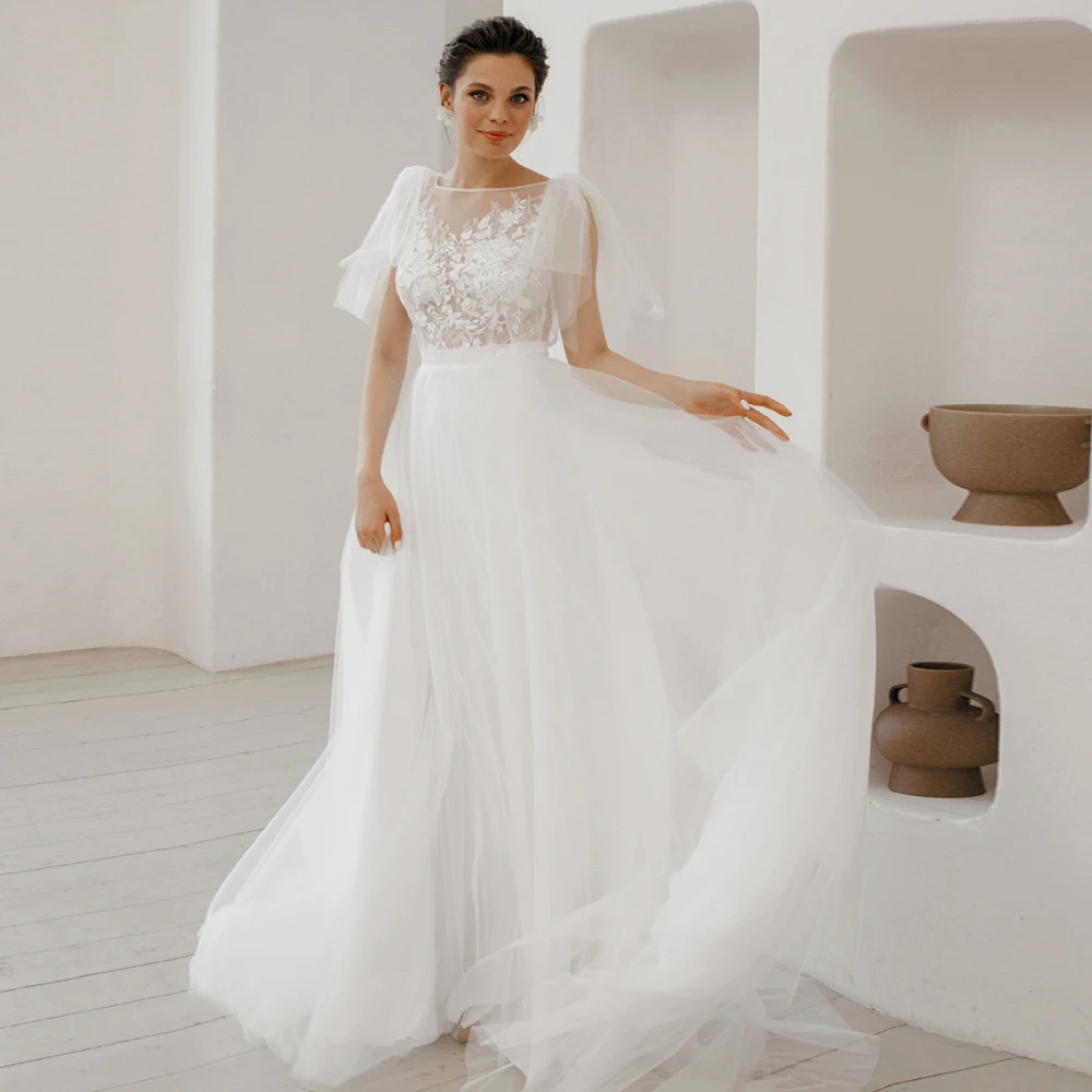 Simple Tulle Wedding Dresses 2021 Women O-Neck Lace Applique Wedding Gown Sexy Backless A-Line Ivory Bridal Dress robe de mariée
Simple Tulle Wedding Dresses 2021 Women O-Neck Lace Applique Wedding Gown Sexy Backless A-Line Ivory Bridal Dress robe de mariée