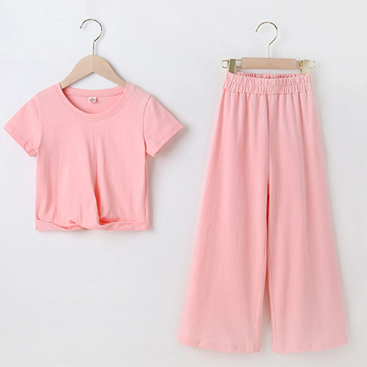 New Summer Kids Girls Clothes Set Pure Color Short Sleeve T-shirt Tops Wide Leg Pants Fashion Casual Teenage Girls Clothing Set
New Summer Kids Girls Clothes Set Pure Color Short Sleeve T-shirt Tops Wide Leg Pants Fashion Casual Teenage Girls Clothing Set
