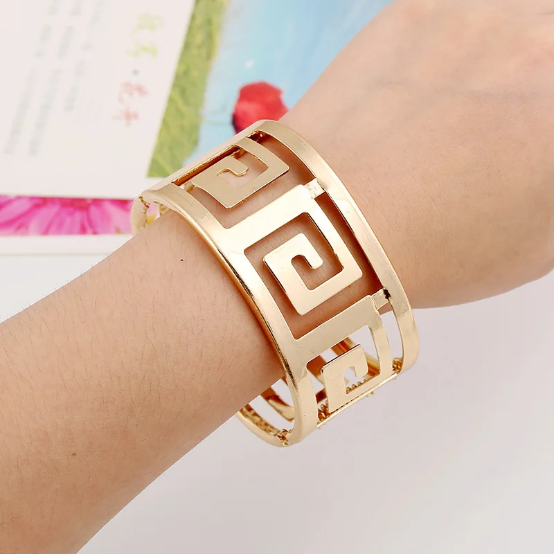 Quality Luxury Golden Personality Exaggerated Punk Wide Bracelet Geometric Hollow Bracelet Ladies Jewelry 
Quality Luxury Golden Personality Exaggerated Punk Wide Bracelet Geometric Hollow Bracelet Ladies Jewelry