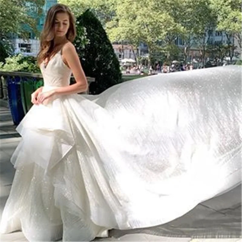 Verngo New Shiny Wedding Dress A Line Spaghetti Straps Ruffles Modest Bridal Gowns Sweep Train Elegant Vestido de noiva
Verngo New Shiny Wedding Dress A Line Spaghetti Straps Ruffles Modest Bridal Gowns Sweep Train Elegant Vestido de noiva
