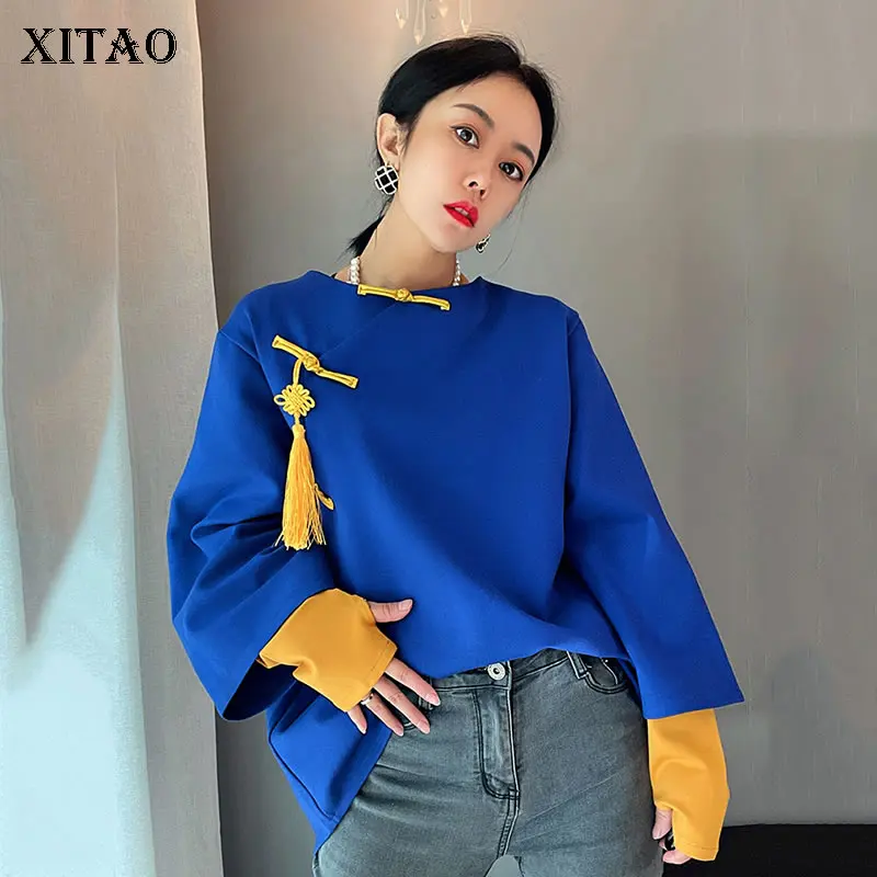 XITAO, женская блузка в китайском стиле, контрастный цвет, Сращивание, китайский узел, кисточка, пряжка, 2021, Осень-зима, новая мода, свободные, ...
XITAO, женская блузка в китайском стиле, контрастный цвет, Сращивание, китайский узел, кисточка, пряжка, 2021, Осень-зима, новая мода, свободные, ...