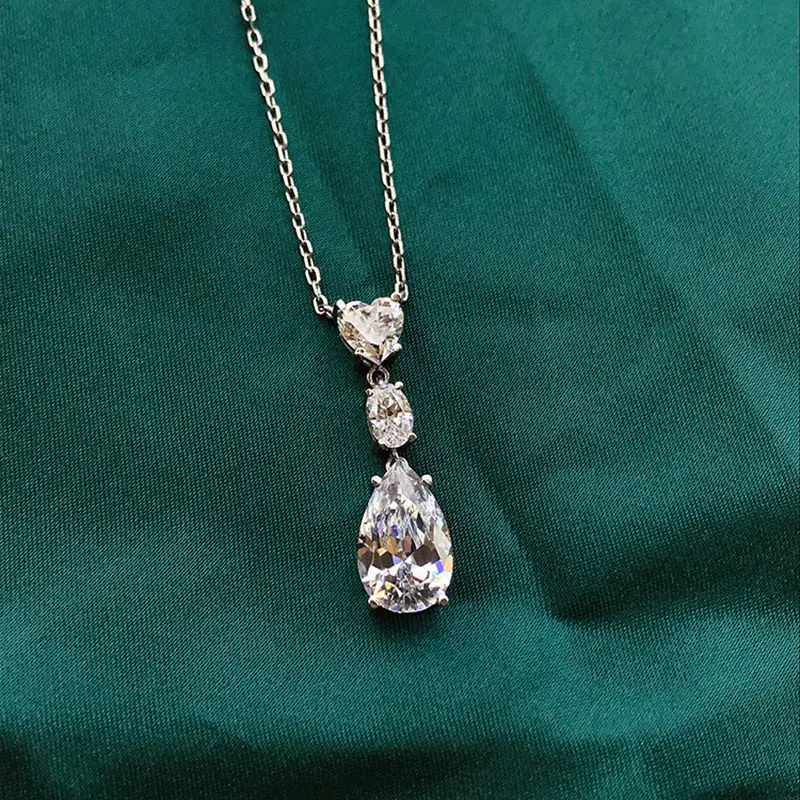 Wong Rain 100% 925 Sterling Silver Pear Cut Created Moissanite Gemstone Wedding 8*13MM Romantic Pendent Necklace Fine Jewelry
Wong Rain 100% 925 Sterling Silver Pear Cut Created Moissanite Gemstone Wedding 8*13MM Romantic Pendent Necklace Fine Jewelry