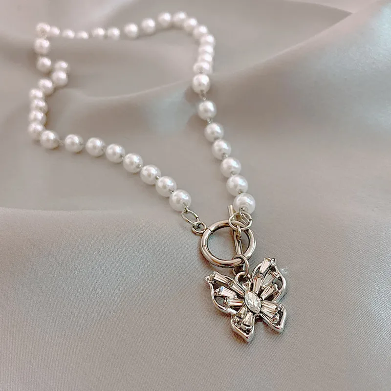 Toggle Clasp Imitation Pearl Choker Necklace Sweet Rhinestone Crystal Butterfly Pendant Necklace for Women Girl Gold Bead
Toggle Clasp Imitation Pearl Choker Necklace Sweet Rhinestone Crystal Butterfly Pendant Necklace for Women Girl Gold Bead