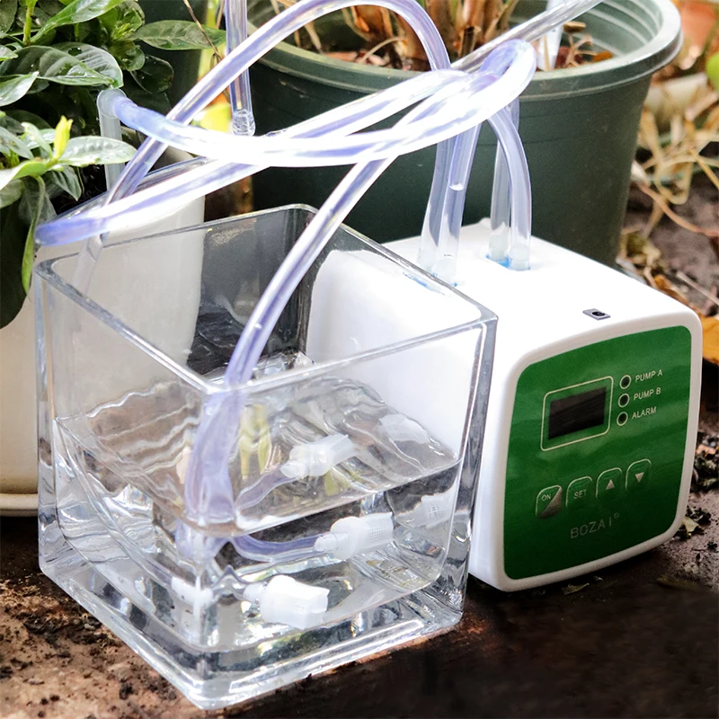 Smart Garden Irrigation Potted Plants Watering Sprayer Double Pump Intelligent Controller Timer Automatic Drip Sprinkler System
Smart Garden Irrigation Potted Plants Watering Sprayer Double Pump Intelligent Controller Timer Automatic Drip Sprinkler System