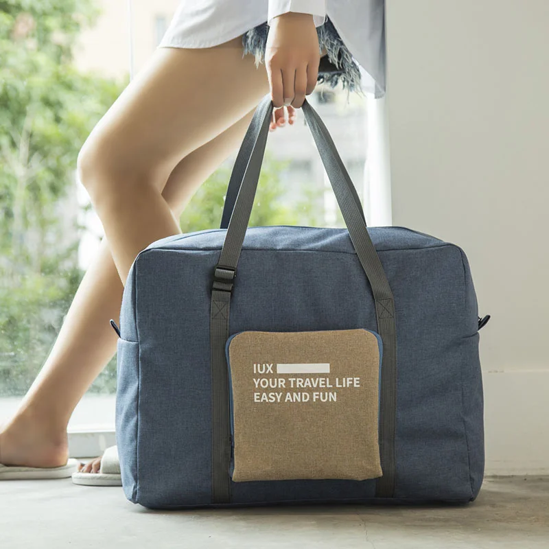 Large-capacity Foldable Travel Bag Unisex Nylon Convenient Travel Bag Hand Luggage Bag Waterproof and Wear-resistant Storage Bag 
Large-capacity Foldable Travel Bag Unisex Nylon Convenient Travel Bag Hand Luggage Bag Waterproof and Wear-resistant Storage Bag