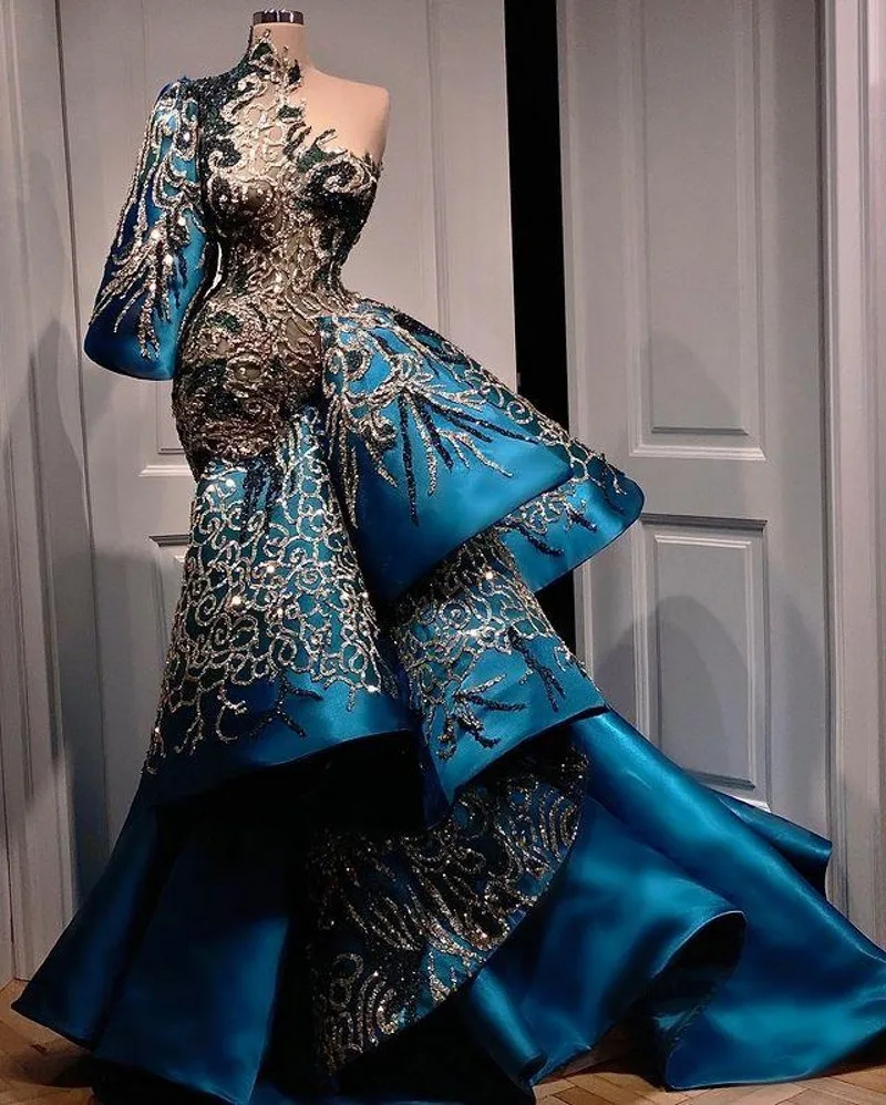 2021 Luxury One Shoulder Arabic Evening Dresses Satin Sequin Applqiue Ruffles Skirt Prom Gowns Women Party Wear
2021 Luxury One Shoulder Arabic Evening Dresses Satin Sequin Applqiue Ruffles Skirt Prom Gowns Women Party Wear