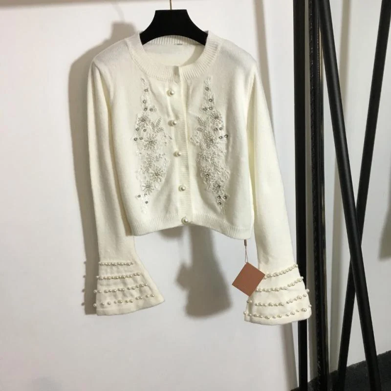 Шерстяной вязаный кардиган, зимняя женская одежда, Роскошный дизайнерский свитер с длинными рукавами и бусинами, украшенный жемчугом и выш...
Шерстяной вязаный кардиган, зимняя женская одежда, Роскошный дизайнерский свитер с длинными рукавами и бусинами, украшенный жемчугом и выш...