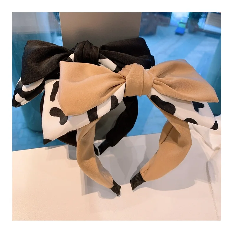Korean original styling cow polka dot temperament headband sweet small fresh color matching three-dimensional bow headband
Korean original styling cow polka dot temperament headband sweet small fresh color matching three-dimensional bow headband