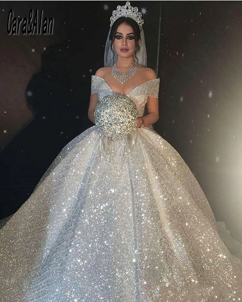 Sparkle Arabic Victoria Robe De Soirée De Mariage Ball Gown Wedding Dresses 2021 Off the Shoulder Sequin Vintage Bridal Gowns 
Sparkle Arabic Victoria Robe De Soirée De Mariage Ball Gown Wedding Dresses 2021 Off the Shoulder Sequin Vintage Bridal Gowns