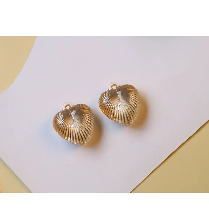 10Pcs 19*21MM 3D Acrylic Gold Love Heart Charms For DIY Making Earrings Necklace Bracelet Jewelry Accessories
10Pcs 19*21MM 3D Acrylic Gold Love Heart Charms For DIY Making Earrings Necklace Bracelet Jewelry Accessories