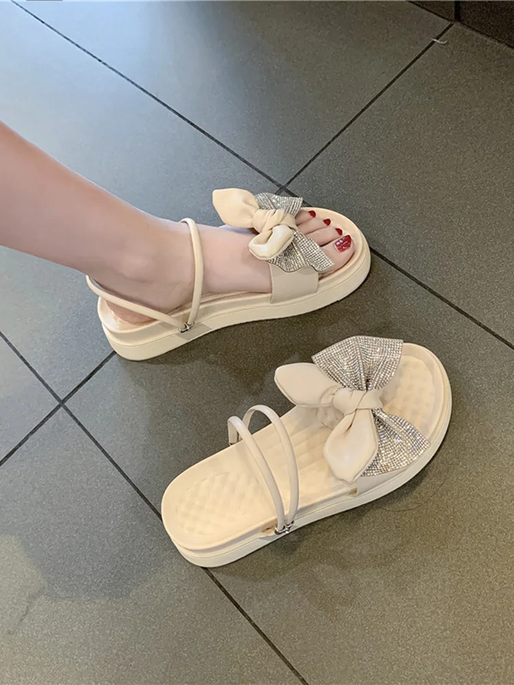 Ladies sandals 2021 new female summer soft bottom fairy wind bow all-match rhinestone dual-use sandals Gothic shoes
Ladies sandals 2021 new female summer soft bottom fairy wind bow all-match rhinestone dual-use sandals Gothic shoes