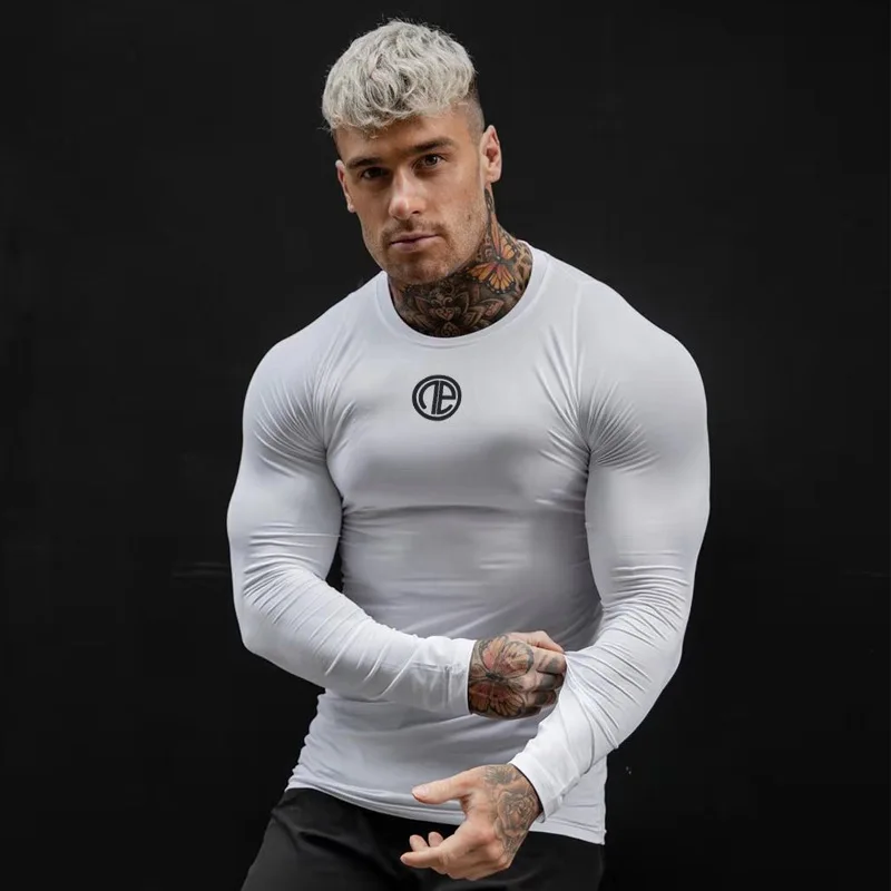 Gym T Shirt Men Fitness Bodybuilding Clothing Workout Quick Dry Long Sleeve Shirt Male Spring Sports Tops Compression Tee Shirt
Gym T Shirt Men Fitness Bodybuilding Clothing Workout Quick Dry Long Sleeve Shirt Male Spring Sports Tops Compression Tee Shirt