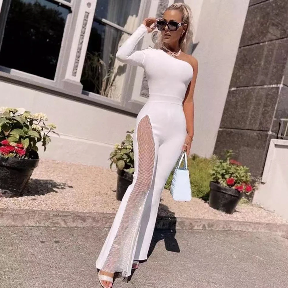NEW Mesh Diamond Bling Jumpsuit Women Black Long Sleeved Diagonal Collar Black Wide Leg Flare Pants Sexy Jumpsuits High Quality
NEW Mesh Diamond Bling Jumpsuit Women Black Long Sleeved Diagonal Collar Black Wide Leg Flare Pants Sexy Jumpsuits High Quality