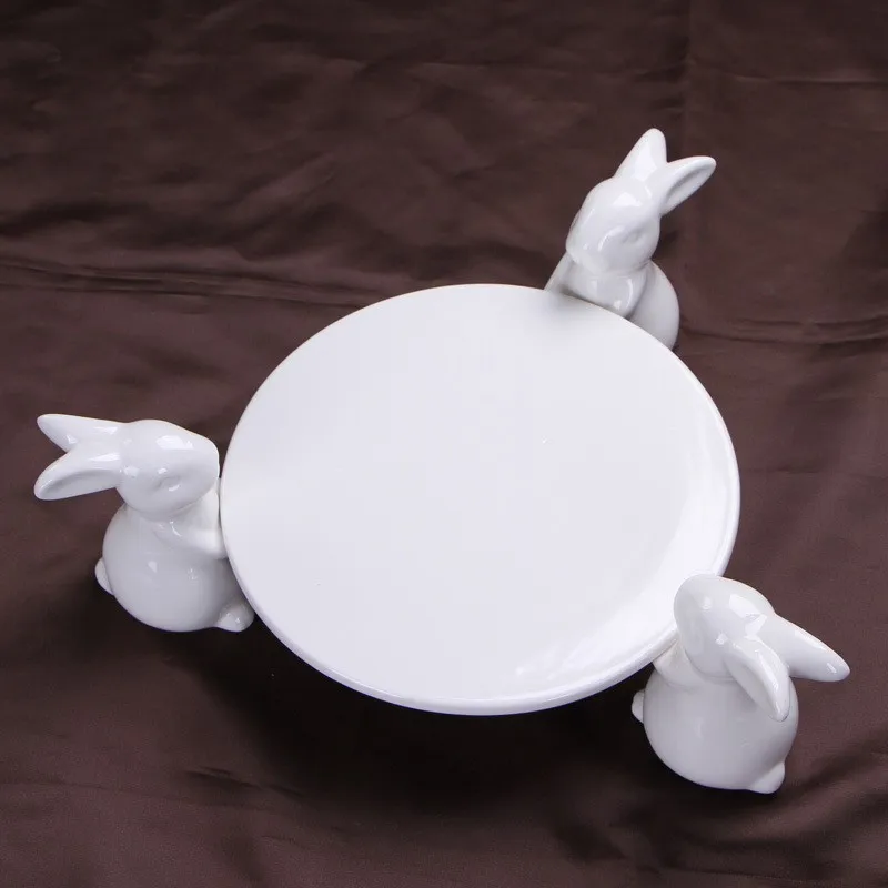 Creative Ceramics Rabbit Cake Plate Stand Decorative Porcelain Bunny Statue Fruits Plate Dinnerware Ornament Gift and Craft
Creative Ceramics Rabbit Cake Plate Stand Decorative Porcelain Bunny Statue Fruits Plate Dinnerware Ornament Gift and Craft