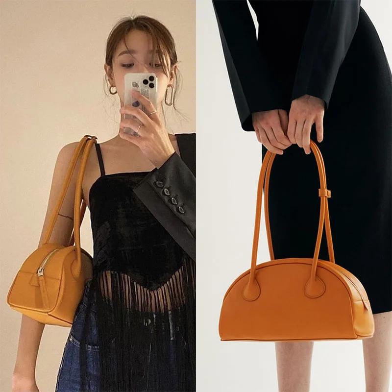 2021 new Korean cowhide shoulder Boston bag long strap dumpling bag leather portable women's bag
2021 new Korean cowhide shoulder Boston bag long strap dumpling bag leather portable women's bag